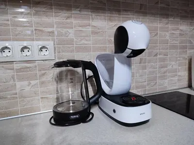 a black and white blender sitting on a counter at Deluxe Studio 200m from Ski Road in Bansko