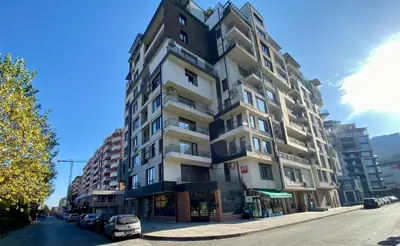a tall building on the side of a street at Flower house 8 in Sofia