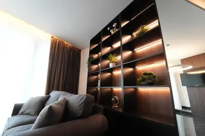 a living room with a couch and some plants at Sofia Paradise Lux Apartment in Sofia