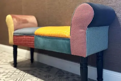 a chair sitting in a corner with a colorful seat at Contemporary Charm in Old Sofia in Sofia