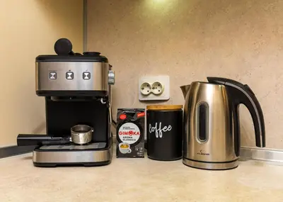 a coffeemaker and coffee maker on a kitchen counter at South Plovdiv - 2BD Flat with Balcony by Flat Mаnager in Plovdiv