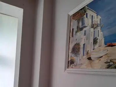 a picture of a painting on a wall at Sofia Zen - on Metro, ultra fast Wi-Fi in Sofia