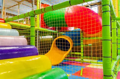 a play area with a bunch of different colored play equipment at Grande Vista Resort & Spa in Tsigov Chark