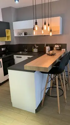 a kitchen with a island with a counter top at 2 BED APARTMENT IN BANSKO RESORT in Bansko