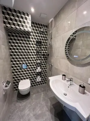 a bathroom with a sink and a toilet at LOCATION ! LOCATION ! LOCATION ! City Garden View Apartment in Sofia