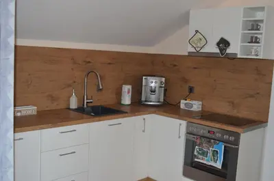 a kitchen with a sink and a counter top at Artistic loft with AMAZING VIEW in Plovdiv