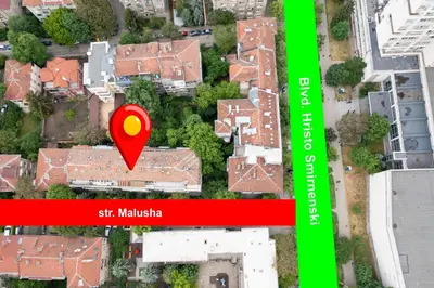 a map of a house with a red marker at Our Place in Sofia