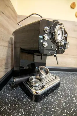 a camera sitting on top of a counter at Comfort & Cozy Apartment in Sofia Center in Sofia
