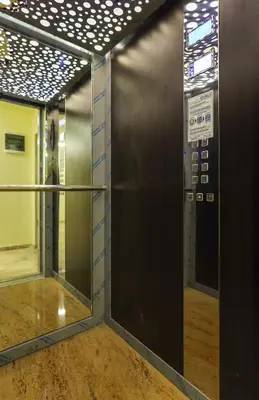 a elevator in a room with a glass door at Old Town View in Plovdiv