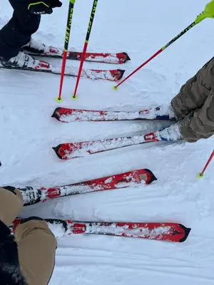 a group of people on skis in the snow at Villa Le Cinema in Shiroki Dol