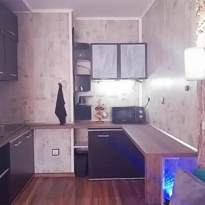 a kitchen with a counter and a microwave in it at Alis in Sofia