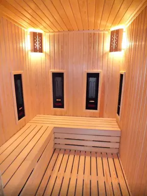 a wooden sauna with two lights on top of it at Hotel Dragalevtsi in Sofia