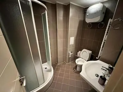 a bathroom with a shower and a toilet and a sink at EXCELLENT LOCATION ! General Gurko apartment in Sofia