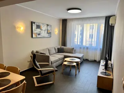 a living room with a couch and a table at EXCELLENT LOCATION ! General Gurko apartment in Sofia