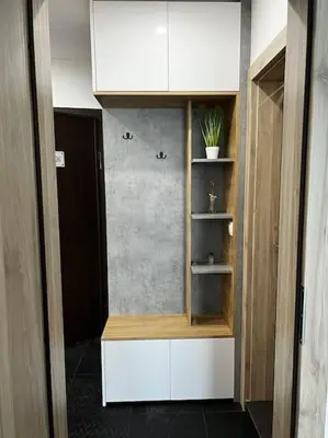 a room with a shelf with a plant in it at Blue & Gold Stylish Apartment in Sofia