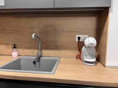 a kitchen counter with a sink and a mixer at 7Mins City Garden and Center+P in Plovdiv