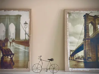 a framed picture of a bridge and a bike on a wall at Entire Apartment for 4 Guests in Sofia in Sofia