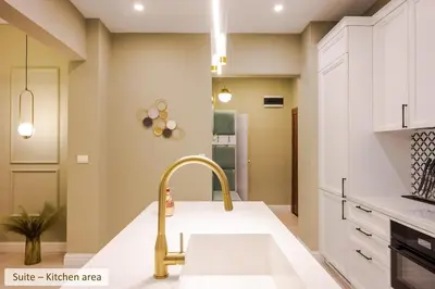 a kitchen with a sink and a faucet at Super Central Stylish Suite & Studio with Shared Terrace by Flat Mаnager in Sofia