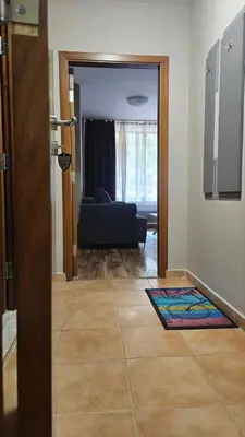 a view of a living room with a couch at Minkov Apartments, Пампорово - Замъка 2 in Pamporovo