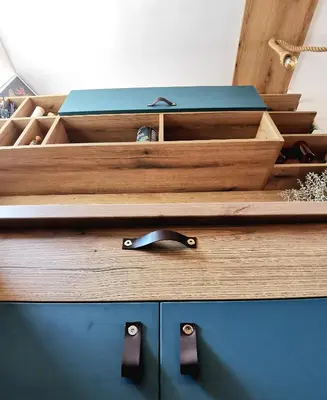 a wooden dresser with a blue drawer at Rare view in Plovdiv