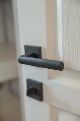 a close up of a door with a black door handle at Central Sofia 3-bedroom apartment - Urban Art gallery - Free Parking! in Sofia