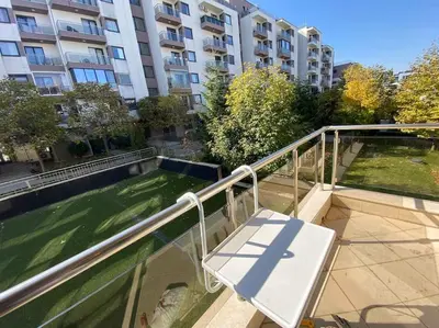 a balcony with a bench and a building at Lovely 1-bedroom appartment in Sofia near Vitosha in Sofia