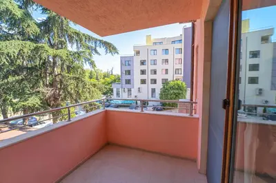 a balcony with a view of a building at Апартамент Амбра in Sandanski
