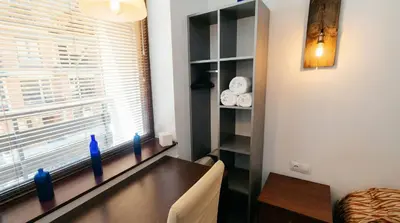 a dining room with a table and a window at Mountain Paradise 2 - Quiet Cosy Studio - Balcony, Wifi in Bansko