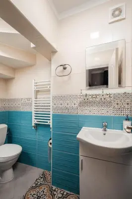 a bathroom with a toilet and a sink at Serdika Old City House in Sofia