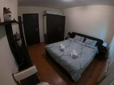 a bedroom with a bed with stuffed animals on it at Apartment in Forest Glade Hotel in Pamporovo