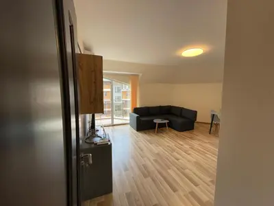 a living room with a couch and a table at Hancho - Velingrad - Marvel Apartament in Velingrad