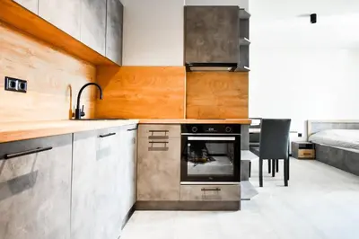 a kitchen with a sink and a stove at 6 Studios 6 Bathrooms 2 Levels Kitchens in Sofia