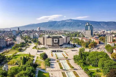 an aerial view of a city with mountains in the background at Vivid Condo by NDK and Vitosha Blvd with Free Secured Parking and AC in Sofia