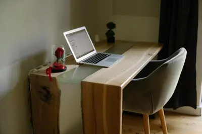 a desk with a laptop computer on top of it at 5 Seconds Away from the Main Street, FREE Secured Parking in Sofia