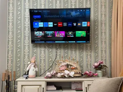 a flat screen tv hanging on a wall at Vintage De Lux, Top Location, 2Bdr Grand Monastery, Pamporovo in Pamporovo