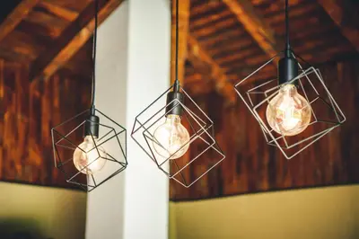 a couple of lights hanging from a ceiling at Forest Oasis Guest House FREE PARKING in Sapareva Banya