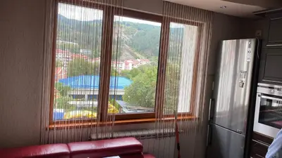 a room with a large window with a view at Eda Aparts in Devin