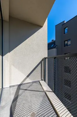 a metal fence on the side of a building at West Haven Apartments - 1BDs in Plovdiv Centre by Flat Mаnager in Plovdiv