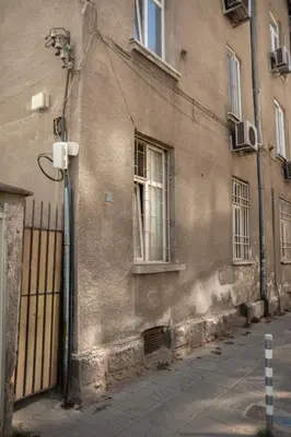 a building with a street light on the side of it at The Cozy Corner in Sofia