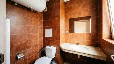 a bathroom with a toilet and a sink at Mountain Paradise 4 - 1 Bedroom - Gondola, 100m away - Washer in Bansko