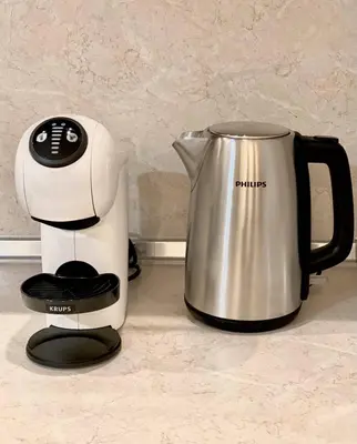 a coffee maker and a coffee pot on a counter at Next to the Ski Lift Downtown Bansko in Bansko