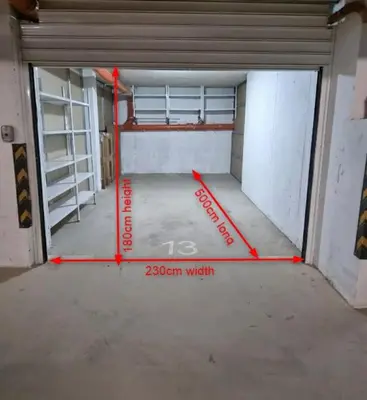 an empty garage with red lines on the inside of it at Maryland Apartment incl Private Garage in Sofia