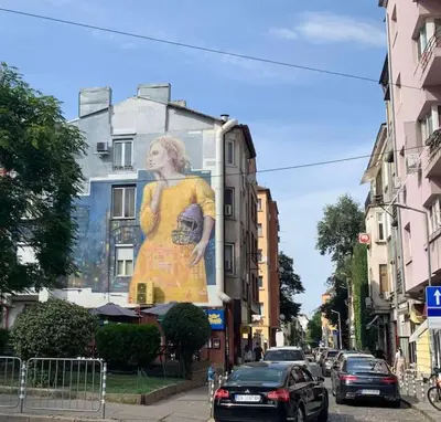 a mural of a woman on the side of a building at Beauty downtown - TOP CENTER in Sofia