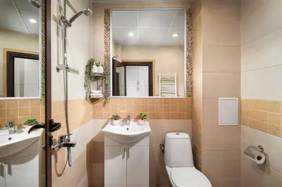 a bathroom with a sink and a toilet and a mirror at Free Parkingon Premises & Enjoy in Sofia