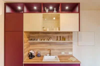 a kitchen with a sink and a refrigerator at Casa Dell'Arte in Sofia