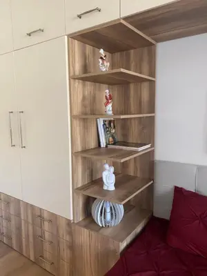 a room with wooden shelves in a bedroom at Casa Dell'Arte in Sofia