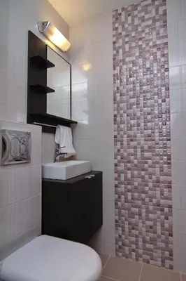 a bathroom with a sink and a toilet and a mirror at Apartment South Park - Louis Eyer in Sofia