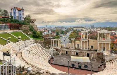 an amphitheater with a city in the background at Cozy 1-bed Apartment 2 in Plovdiv