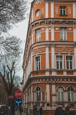 an orange and white building with a stop sign at Lily's Studio 3 by Bulgarentals - Central Sofia in Sofia
