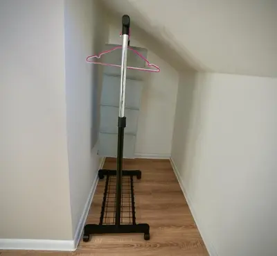 a shelf in a room with a candle on a ladder at Lily's Studio 1 by Bulgarentals - Central Sofia in Sofia